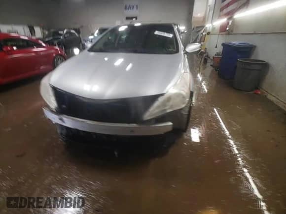 2012 Hyundai Azera с VIN KMHFH4JG6CA150808, выставлен на аукционе Copart как лот 46639735 с пробегом 100 089 миль миль и Списание • Salvage title. История ставок и продаж доступна на DreamBid. Изображение 14.
