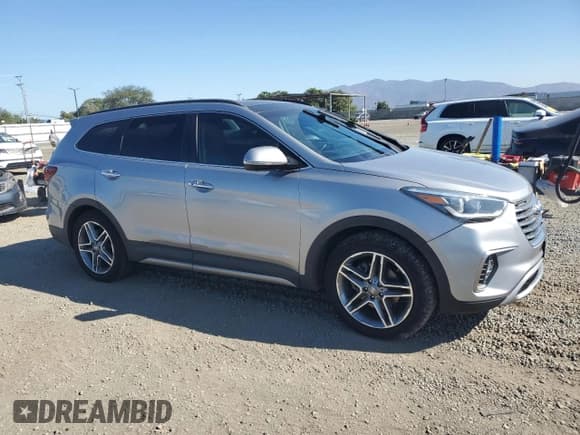 ✅ 2018 Hyundai Santa Fe SE Ultimate • VIN: KM8SR4HFXJU279199 • Лот: 91659675. Опубликован ранее на Copart с пробегом 147 285 миль. Бесплатный доступ к архиву аукционных продаж из США и подробный отчёт об истории автомобиля на DreamBid. Изображение 4.