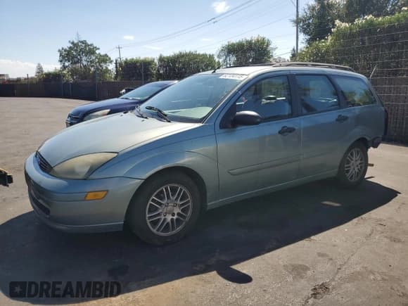 ✅ 2003 Ford Focus • VIN: 1FAHP36Z93W237843 • Lot: 82134115. Listed on Copart with 133,067 mi. Free auction sales archive from the USA and detailed vehicle history report at DreamBid. Image 1.