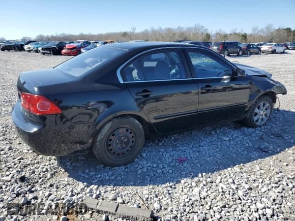 ✅ 2007 Kia Optima LX • VIN: KNAGE124475130198 • Лот: 45585255. Опубликован ранее на Copart с пробегом 303 974 миль. Бесплатный доступ к архиву аукционных продаж из США и подробный отчёт об истории автомобиля на DreamBid. Изображение 3.