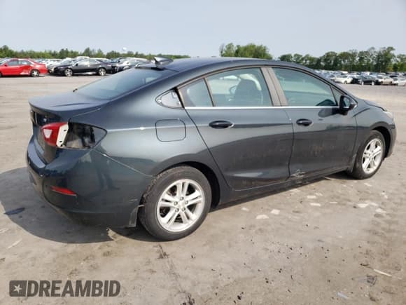 ✅ 2017 Chevrolet Cruze LT • VIN: 1G1BE5SMXH7137711 • Lot: 51823923. Listed on Copart with 33,429 mi. Free auction sales archive from the USA and detailed vehicle history report at DreamBid. Image 3.