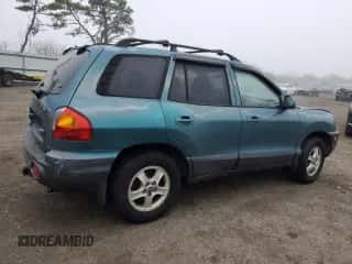 2002 Hyundai Santa Fe GLS с VIN KM8SC73DX2U328945, выставлен на аукционе Copart как лот 51134965 с пробегом 98 503 миль миль и На запчасти • Non repairable. История ставок и продаж доступна на DreamBid. Изображение 3.