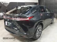 ✅ 2024 Lexus RZ 450e Premium • VIN: JTJAAAAB0RA024617 • Lot: 41536068. Listed on IAAI with 18,966 mi. Free auction sales archive from the USA and detailed vehicle history report at DreamBid. Image 4.