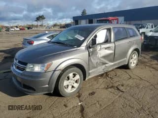 ✅ 2013 Dodge Journey American Value • VIN: 3C4PDCABXDT631187 • Lot: 89620825. Listed on Copart with 132,640 mi. Free auction sales archive from the USA and detailed vehicle history report at DreamBid. Image 1.