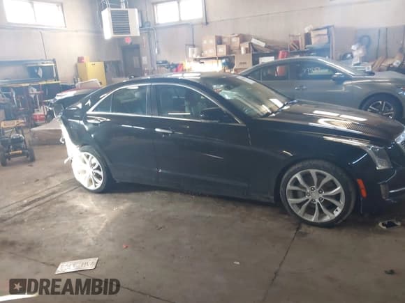 ✅ 2017 Cadillac ATS Performance Collection AWD • VIN: 1G6AJ5SS5H0191376 • Лот: 41685013. Опубликован ранее на IAAI с пробегом 64 188 миль. Бесплатный доступ к архиву аукционных продаж из США и подробный отчёт об истории автомобиля на DreamBid. Изображение 13.