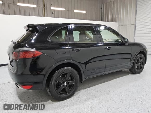 ✅ 2014 Porsche Cayenne • VIN: WP1AA2A21ELA96819 • Lot: 57865565. Listed on Copart with 135,181 mi. Free auction sales archive from the USA and detailed vehicle history report at DreamBid. Image 3.