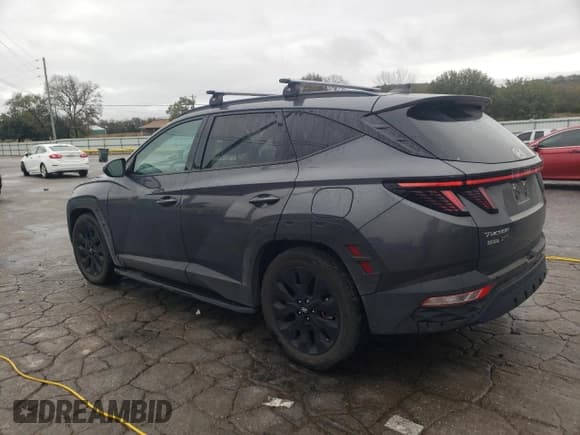 ✅ 2023 Hyundai Tucson XRT • VIN: KM8JF3AE8PU177487 • Lot: 90230195. Wystawiony na Copart z przebiegiem 27 796 mil. Bezpłatny archiwum sprzedaży aukcyjnych z USA i szczegółowy raport historii pojazdu na DreamBid. Zdjęcie 2.