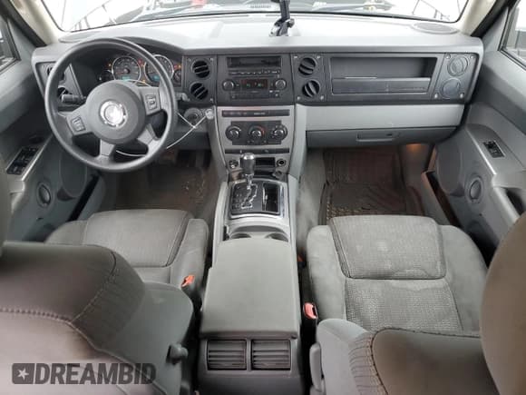 ✅ 2007 Jeep Commander Sport • VIN: 1J8HG48K97C527502 • Lot: 52362625. Wystawiony na Copart z przebiegiem 156 639 mil. Bezpłatny archiwum sprzedaży aukcyjnych z USA i szczegółowy raport historii pojazdu na DreamBid. Zdjęcie 8.