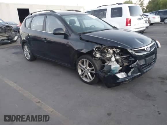 2010 Hyundai Elantra GLS z VIN KMHDC8AE7AU063507, wystawiony jako IAAI lot #43283514 z przebiegiem 155 437 mil mil oraz . Historia ofert i sprzedaży dostępna na DreamBid. Obrazek 1.