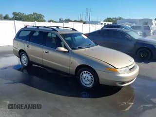 ✅ 2001 Saturn LW • VIN: 1G8JW82R81Y560777 • Лот: 43484705. Опубликован ранее на IAAI с пробегом 100 746 миль. Бесплатный доступ к архиву аукционных продаж из США и подробный отчёт об истории автомобиля на DreamBid. Изображение 1.