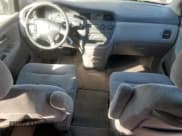 ✅ 2004 Honda Odyssey EX • VIN: 5FNRL18604B060185 • Lot: 87412525. Listed on Copart with 166,824 mi. Free auction sales archive from the USA and detailed vehicle history report at DreamBid. Image 8.