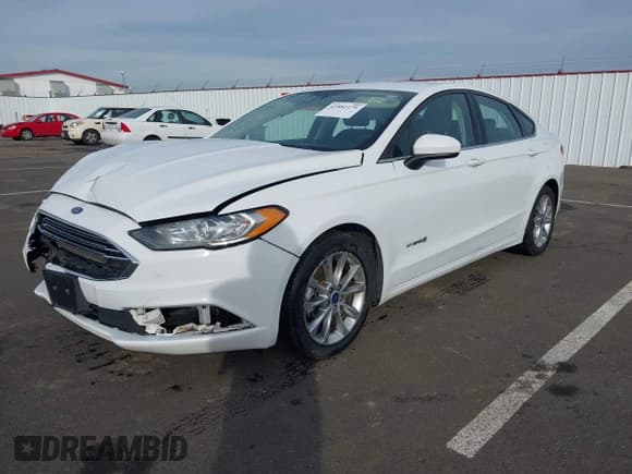 ✅ 2017 Ford Fusion Hybrid SE • VIN: 3FA6P0LU6HR355406 • Lot: 43581175. Listed on IAAI with 112,942 mi. Free auction sales archive from the USA and detailed vehicle history report at DreamBid. Image 20.