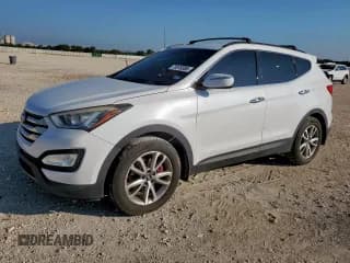 ✅ 2015 Hyundai Santa Fe • VIN: 5XYZU3LAXFG266131 • Lot: 70878385. Wystawiony na Copart z przebiegiem 98 363 mil. Bezpłatny archiwum sprzedaży aukcyjnych z USA i szczegółowy raport historii pojazdu na DreamBid. Zdjęcie 1.
