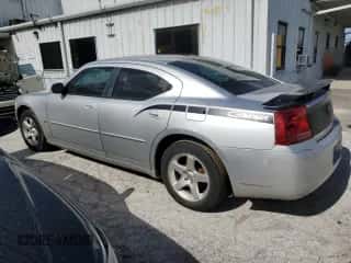 2010 Dodge Charger SXT с VIN 2B3CA3CV9AH107260, выставлен на аукционе Copart как лот 77408734 с пробегом Не указан миль и Списание • Salvage title. История ставок и продаж доступна на DreamBid. Изображение 2.
