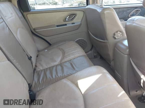 2005 Mercury Mariner Luxury z VIN 4M2CU56165DJ21267, wystawiony jako IAAI lot #41934003 z przebiegiem Nie podano mil oraz . Historia ofert i sprzedaży dostępna na DreamBid. Obrazek 8.