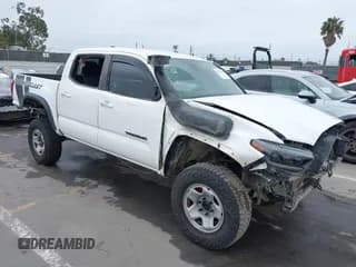✅ 2021 Toyota Tacoma SR • VIN: 3TMCZ5AN6MM417278 • Lot: 42171336. Listed on IAAI with 67,955 mi. Free auction sales archive from the USA and detailed vehicle history report at DreamBid. Image 1.