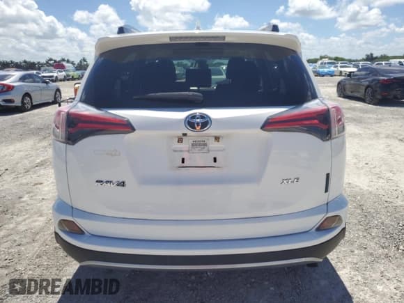 ✅ 2018 Toyota RAV4 XLE • VIN: JTMWFREVXJD127480 • Lot: 61004625. Listed on Copart with 33,179 mi. Free auction sales archive from the USA and detailed vehicle history report at DreamBid. Image 6.