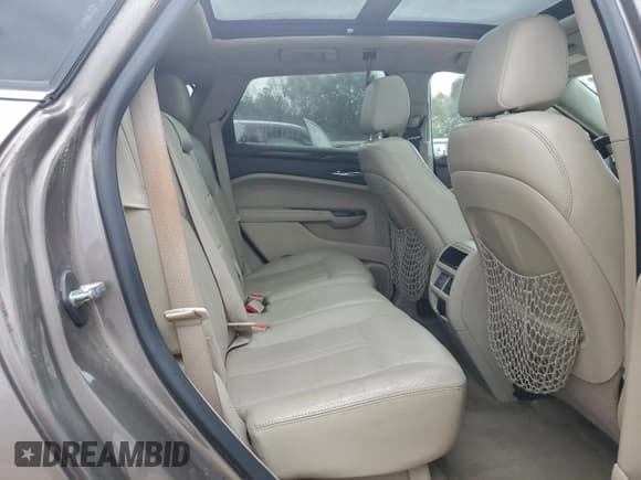 ✅ 2012 Cadillac SRX Performance Collection • VIN: 3GYFNBE37CS532590 • Lot: 94237585. Listed on Copart with 166,412 mi. Free auction sales archive from the USA and detailed vehicle history report at DreamBid. Image 11.