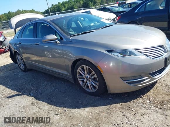 ✅ 2015 Lincoln MKZ • VIN: 3LN6L2GKXFR621223 • Lot: 40269076. Wystawiony na IAAI z przebiegiem 82 513 mil. Bezpłatny archiwum sprzedaży aukcyjnych z USA i szczegółowy raport historii pojazdu na DreamBid. Zdjęcie 1.
