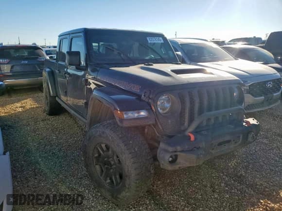 ✅ 2023 Jeep Gladiator Mojave • VIN: 1C6JJTEG5PL520560 • Lot: 82078145. Listed on Copart with 50,464 mi. Free auction sales archive from the USA and detailed vehicle history report at DreamBid. Image 4.