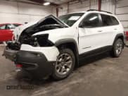 ✅ 2022 Jeep Cherokee Trailhawk • VIN: 1C4PJMBX9ND504737 • Lot: 42253723. Listed on IAAI with 25,235 mi. Free auction sales archive from the USA and detailed vehicle history report at DreamBid. Image 2.