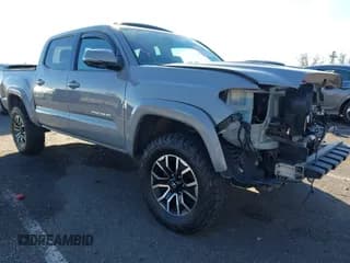 ✅ 2021 Toyota Tacoma SR • VIN: 3TYCZ5AN3MT008384 • Lot: 43770047. Listed on IAAI with 56,610 mi. Free auction sales archive from the USA and detailed vehicle history report at DreamBid. Image 1.