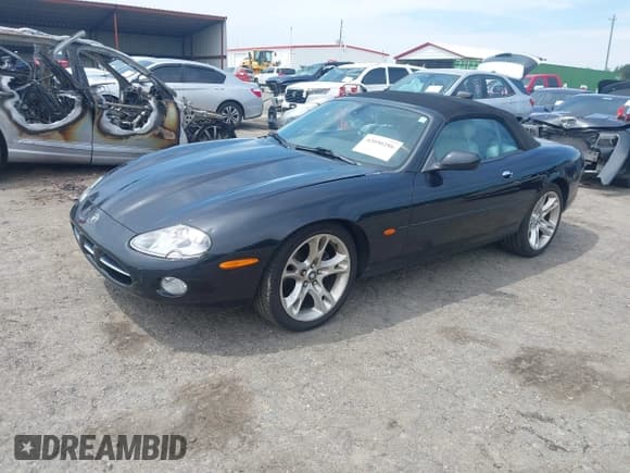 ✅ 2003 Jaguar XK • VIN: SAJDA42C732A35547 • Lot: 42090286. Listed on IAAI with 65,840 mi. Free auction sales archive from the USA and detailed vehicle history report at DreamBid. Image 2.
