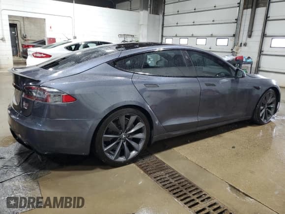 ✅ 2022 Tesla Model S Plaid • VIN: 5YJSA1E64NF460280 • Lot: 60063745. Listed on Copart with 42,387 mi. Free auction sales archive from the USA and detailed vehicle history report at DreamBid. Image 3.