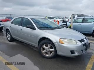 ✅ 2004 Dodge Stratus SXT • VIN: 1B3EL46R14N361340 • Lot: 41704096. Listed on IAAI with 102,557 mi. Free auction sales archive from the USA and detailed vehicle history report at DreamBid. Image 1.