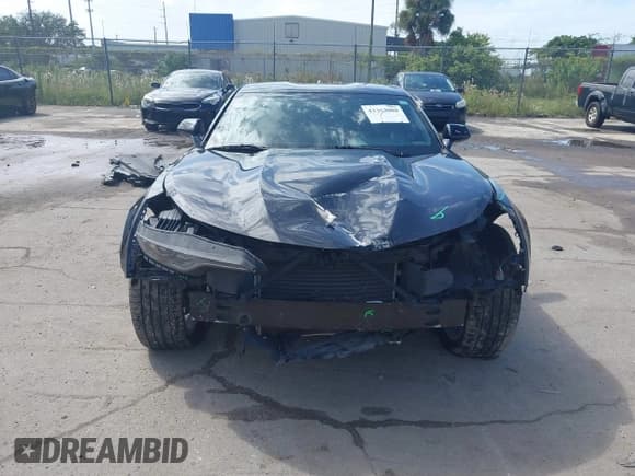 ✅ 2021 Chevrolet Camaro 1LT • VIN: 1G1FB1RS0M0114531 • Lot: 43363088. Listed on IAAI with 52,499 mi. Free auction sales archive from the USA and detailed vehicle history report at DreamBid. Image 12.