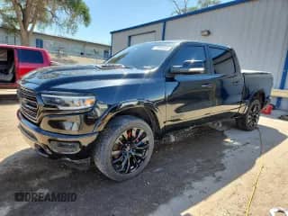 2020 Ram 1500 Limited with VIN 1C6SRFHT6LN342633, listed as a Copart auction lot 72099995 with 100,469 mi miles and Salvage title. Bid and sale history available at DreamBid. Image 1.