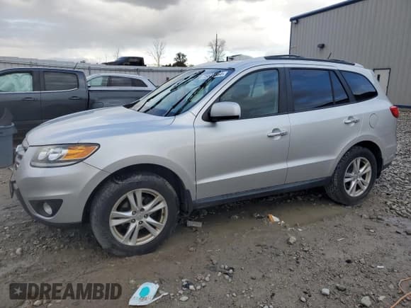 ✅ 2012 Hyundai Santa Fe Limited • VIN: 5XYZK3AB3CG156227 • Lot: 75824564. Listed on Copart with 149,767 mi. Free auction sales archive from the USA and detailed vehicle history report at DreamBid. Image 1.