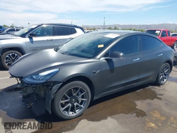 ✅ 2018 Tesla Model 3 Long Range Battery • VIN: 5YJ3E1EA4JF021040 • Лот: 42966467. Опубликован ранее на IAAI с пробегом 102 787 миль. Бесплатный доступ к архиву аукционных продаж из США и подробный отчёт об истории автомобиля на DreamBid. Изображение 2.