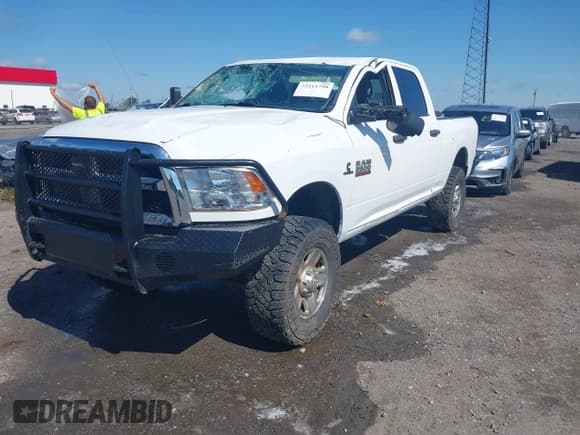 ✅ 2017 Ram 2500 Tradesman • VIN: 3C6UR5CLXHG634148 • Lot: 42211758. Listed on IAAI with 176,692 mi. Free auction sales archive from the USA and detailed vehicle history report at DreamBid. Image 2.