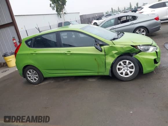 2014 Hyundai Accent GS z VIN KMHCT5AE5EU170717, wystawiony jako IAAI lot #43089589 z przebiegiem 109 181 mil mil oraz . Historia ofert i sprzedaży dostępna na DreamBid. Obrazek 14.