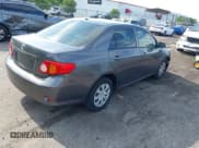 ✅ 2010 Toyota Corolla • VIN: JTDBU4EE0AJ075558 • Lot: 42333233. Listed on IAAI with 98,969 mi. Free auction sales archive from the USA and detailed vehicle history report at DreamBid. Image 4.