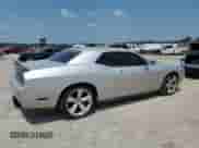 2009 Dodge Challenger SRT-8 z VIN 2B3LJ74W89H503304, wystawiony jako Copart lot #66750884 z przebiegiem Nie podano mil oraz Czysty tytuł • Clean title. Historia ofert i sprzedaży dostępna na DreamBid. Obrazek 3.
