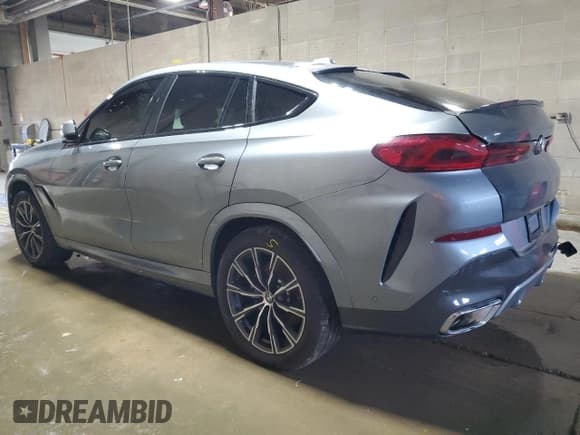 ✅ 2024 BMW X6 xDrive40i • VIN: 5UX33EX01R9S30113 • Лот: 62905085. Опубликован ранее на Copart с пробегом 10 076 миль. Бесплатный доступ к архиву аукционных продаж из США и подробный отчёт об истории автомобиля на DreamBid. Изображение 2.