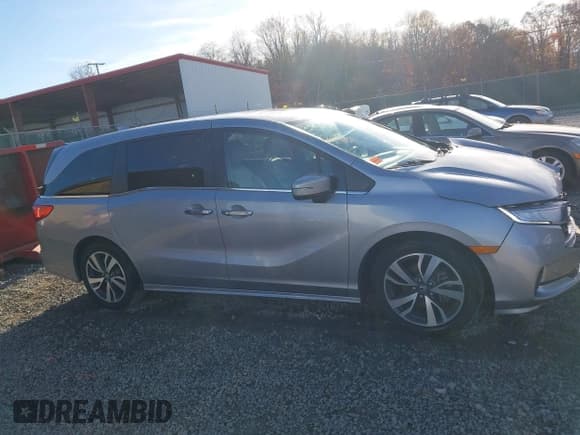 ✅ 2022 Honda Odyssey Touring • VIN: 5FNRL6H88NB053680 • Lot: 43611504. Listed on IAAI with 54,275 mi. Free auction sales archive from the USA and detailed vehicle history report at DreamBid. Image 14.