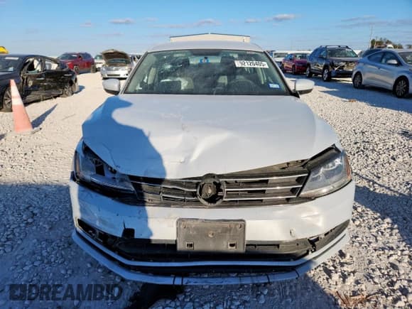 ✅ 2017 Volkswagen Jetta S • VIN: 3VW2B7AJ0HM233014 • Lot: 92120405. Listed on Copart with 141,155 mi. Free auction sales archive from the USA and detailed vehicle history report at DreamBid. Image 5.