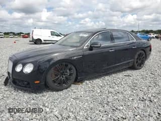 ✅ 2015 Bentley Flying Spur • VIN: SCBEC9ZAXFC049956 • Лот: 84862975. Опубликован ранее на Copart с пробегом 57 234 миль. Бесплатный доступ к архиву аукционных продаж из США и подробный отчёт об истории автомобиля на DreamBid. Изображение 1.