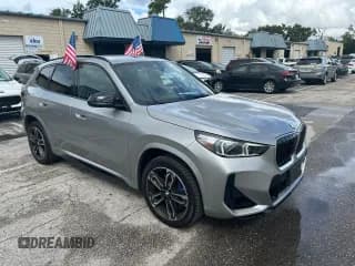 ✅ 2024 BMW X1 • VIN: WBX13EF03R5Y13996 • Lot: 86320365. Wystawiony na Copart z przebiegiem 20 651 mil. Bezpłatny archiwum sprzedaży aukcyjnych z USA i szczegółowy raport historii pojazdu na DreamBid. Zdjęcie 1.