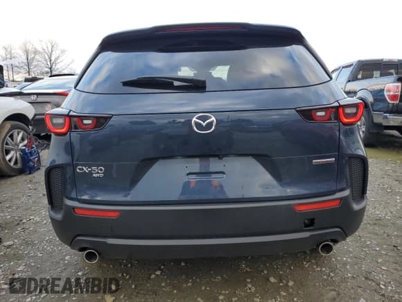 ✅ 2023 Mazda CX-50 S Preferred Plus • VIN: 7MMVABCM6PN117219 • Лот: 38519253. Опубликован ранее на Copart с пробегом 3 405 миль. Бесплатный доступ к архиву аукционных продаж из США и подробный отчёт об истории автомобиля на DreamBid. Изображение 6.