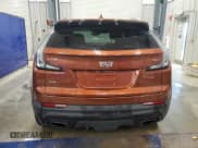 ✅ 2020 Cadillac XT4 AWD Sport • VIN: 1GYFZFR46LF137559 • Лот: 89524685. Опубликован ранее на Copart с пробегом 64 208 миль. Бесплатный доступ к архиву аукционных продаж из США и подробный отчёт об истории автомобиля на DreamBid. Изображение 6.