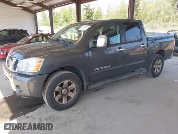 ✅ 2005 Nissan Titan LE • VIN: 1N6AA07B75N553857 • Lot: 42110183. Listed on IAAI with 166,064 mi. Free auction sales archive from the USA and detailed vehicle history report at DreamBid. Image 17.