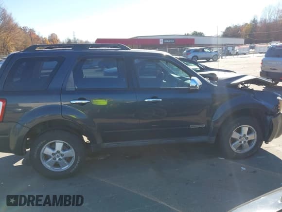 ✅ 2008 Ford Escape XLS • VIN: 1FMCU02Z58KB25956 • Лот: 43708145. Опубликован ранее на IAAI с пробегом 326 117 миль. Бесплатный доступ к архиву аукционных продаж из США и подробный отчёт об истории автомобиля на DreamBid. Изображение 14.