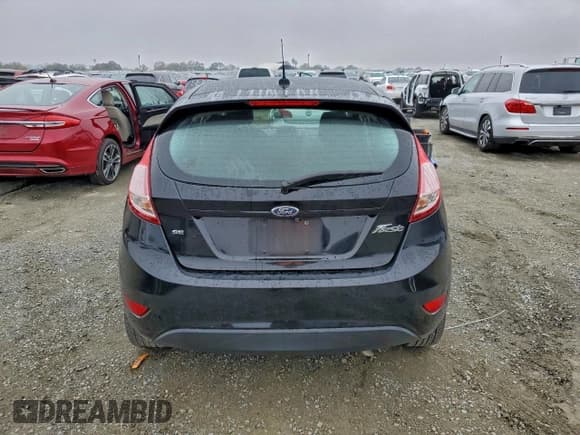 ✅ 2019 Ford Fiesta SE • VIN: 3FADP4EJ8KM133729 • Lot: 94274545. Wystawiony na Copart z przebiegiem 102 031 mil. Bezpłatny archiwum sprzedaży aukcyjnych z USA i szczegółowy raport historii pojazdu na DreamBid. Zdjęcie 6.
