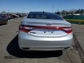 ✅ 2014 Hyundai Azera Limited • VIN: KMHFH4JG0EA410865 • Лот: 50583525. Опубликован ранее на Copart с пробегом Не указан. Бесплатный доступ к архиву аукционных продаж из США и подробный отчёт об истории автомобиля на DreamBid. Изображение 6.