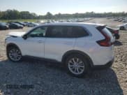 ✅ 2023 Honda CR-V EX-L • VIN: 7FARS3H70PE013190 • Lot: 62726755. Listed on Copart with 33,859 mi. Free auction sales archive from the USA and detailed vehicle history report at DreamBid. Image 2.