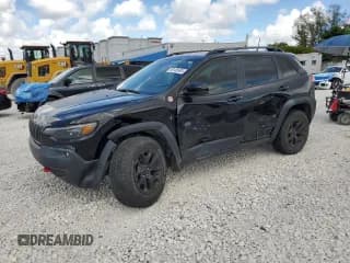 ✅ 2022 Jeep Cherokee Trailhawk • VIN: 1C4PJMBX4ND543297 • Lot: 90106905. Listed on Copart with 34,233 mi. Free auction sales archive from the USA and detailed vehicle history report at DreamBid. Image 1.